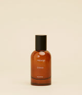 Eau de parfum Aēsop Eidesis. flacon en verre transparent fumé.