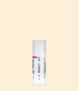 Baume teinté lèvres et joues relipidant La Bruket, 337 Wild Raspberry