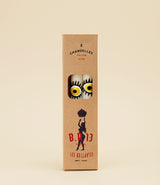 Set of two Yellow Eyes candles by Biutiful Room 13. Cardboard box made in our workshop.
