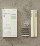 MD Paper Drawing Kit. Composition kit with 5 pencils, 5 caps and a pencil sharpener